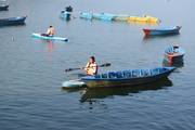 Students enjoying a scenic boat ride on Phewa Lake during an educational tour to Pokhara.
