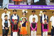 Students performing on stage during the Annual Day celebration.