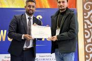 A participant receives a certificate of participation for successfully completing the NFRS Workshop.