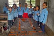 Primary level students of Ram Janaki Secondary School participating in an interactive alphabet learning session.