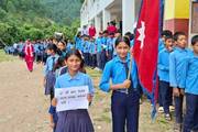 Students participating in a rally to celebrate National Children's Day.