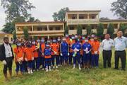 Students and staff of Laxmi Secondary School during a campus cleaning campaign.