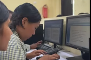 A student in the computer lab at Mahendra Secondary School.