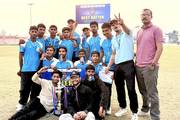 Teachers participating in a volleyball match during the Second Narayani Model Cup-2082.