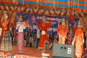 Students showcase their vibrant talents through traditional dance performances.