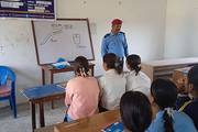 Students of Saraswati Secondary School attending a cybersecurity awareness session conducted by Nepal Police.