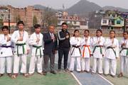 Students of Satyawati Secondary School with their medals in karate.