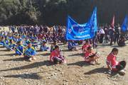 ECA Day: Students Enjoying Outdoor Activities with School Flags at Janasewa Model Secondary School