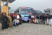 Students gathered for a group photograph before embarking on an educational tour.
