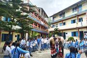 Students of Gokundeshwor Secondary School celebrating cultural traditions within the school's premises.