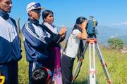 Civil engineering students of Shree Gautam Buddha Secondary School are gaining practical experience during a field surveying session.