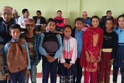 Students participating in a creative drama performance as part of the "Fun Friday" program.