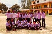 Grade 12 students celebrating the completion of their final examinations on the school premises.