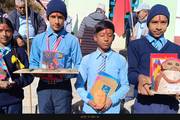 Students showcasing their creative models during a health education extra-curricular activity practical session.