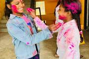 Students during the Holi festival celebration organized on the school premises.