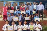 Inter-School Primary Level Quiz Competition participants and winners.
