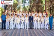 Students being honored for earning their Black Belt certificates in Shito-Ryu Karate-Do.