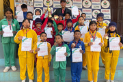 Students of Kathmandu Shikshalaya with their medals and certificates.