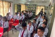Students of Xavier College of Interdisciplinary Studies attend an educational session conducted in the college library.