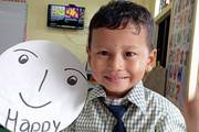 A joyful moment of learning in the early childhood classroom at Mahendra Secondary School.