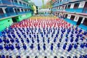 Students gathered for the daily morning assembly and prayer session.
