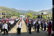 Students participate in the morning assembly and prayer sessions.