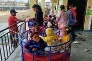 Nursery students engaging in interactive play within the designated recreational area.