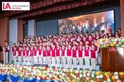 Students performing a choir song during the Annual Parents Day celebration.