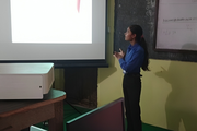 A student of Shree Secondary School delivering a classroom presentation.