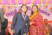 A Student and Teacher during the prize distribution ceremony at Siddhartha Secondary School.