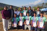 Students honored for their achievements during the prize distribution ceremony of the President Running Shield sports competition.