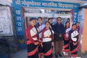 Students of Gokundeshwor Secondary School in traditional attire for a cultural event.