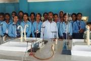 Students participating in a practical learning session within the school’s science laboratory.