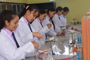 Scientific Inquiry in Practice: Students conducting hands-on experiments in a fully equipped laboratory.