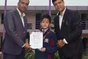 Kicking towards excellence! A proud moment for our young champion at the Tukra Taekwondo Championship