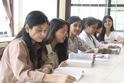 A group of students engaged in a study session at Dibya Deep Jyoti English Secondary School.