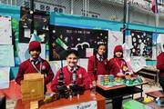 Students presenting their creative projects and models during the Science and Social Exhibition.