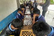 Students participate in a competitive chess tournament organized during Sport Week.