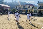 Students demonstrate teamwork and athletic prowess during a volleyball match.