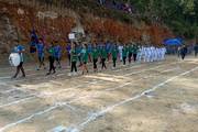 Students of Shree Change Secondary School participate in the march-past during the annual sports meet.