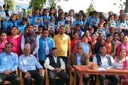 Stationery distribution program for students at Khaireni Secondary School in Tanahun.