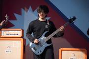 Student of Infomax Playing Guitar during Musical Performance