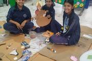 Students preparing for Saraswoti Puja