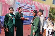 Students and teachers receiving honors and prizes in Kamal Scout second camporee.
