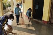 Students cleaning for Saraswoti Puja