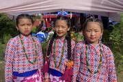 Students in traditional attire during a school event.