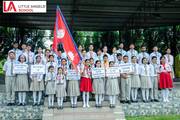 Students rallying support for the youngest finalist of a national talent competition.