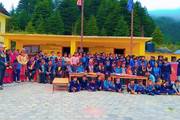 Community Gathering: Students and teachers of Mahadev Secondary School are together.