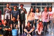 Students after the Holi celebration in the school premises.
