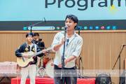 A student delivers an engaging musical performance during the orientation program.